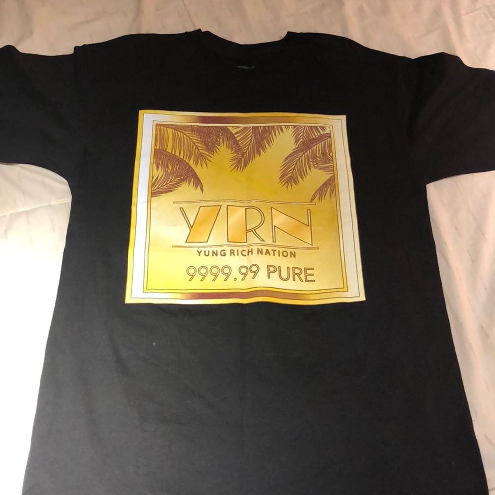 Young rich nation shirt. Never put it on. To small